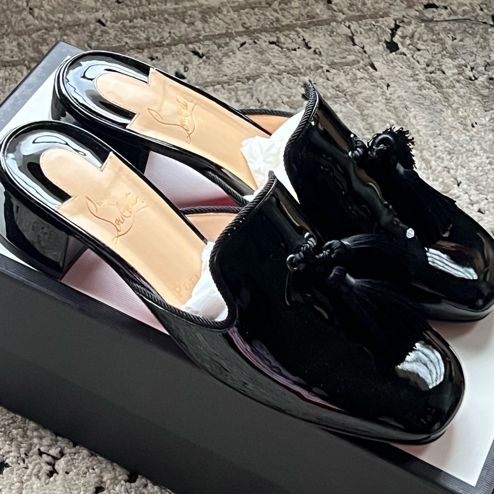 Christian Louboutin patten leather tassel mules
